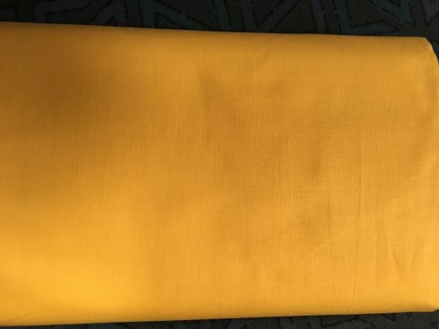 látka Uni žlutá šíře 140cm/100%bavlna